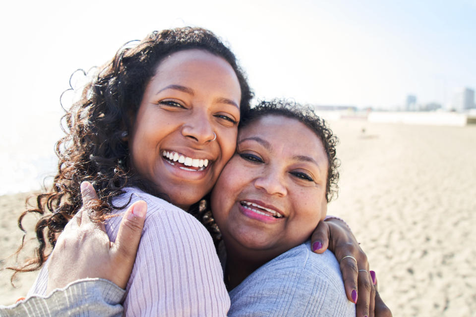 two women hugging each other