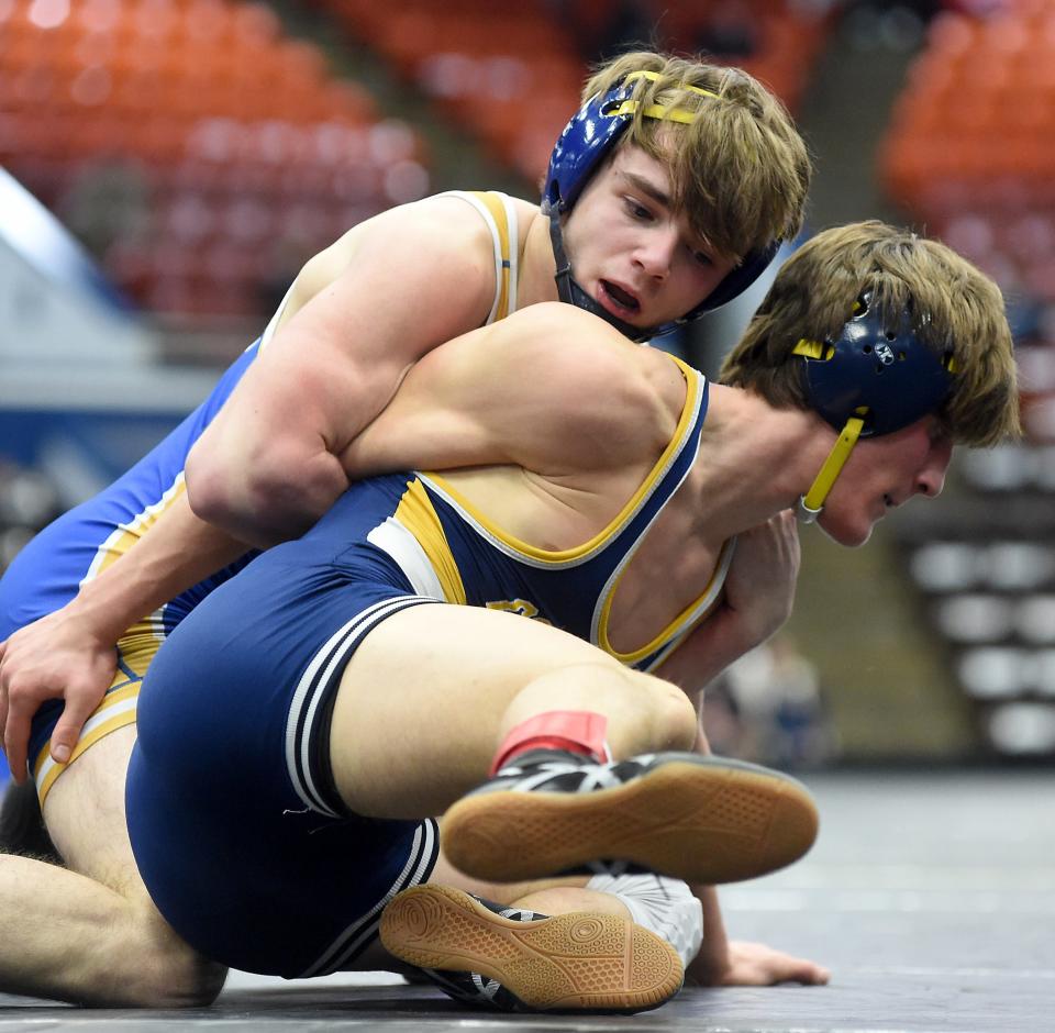 John Allen of Jefferson controls Luke Francis of Goodrich for the win 8-3 at 144 pounds in the D2 state quarterfinals at the Wings Event Center in Kalamazoo Friday, February 24, 2023.