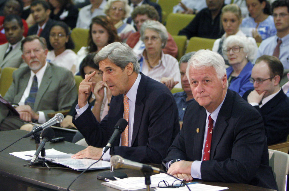 FILE - Sen. John Kerry, center, D-Mass., speaks alongside U.S. Rep. William Delahunt, right, D-Mass., during a public hearing before the Joint Committee on Election Laws at the Statehouse in Boston to press lawmakers to allow Gov. Deval Patrick to name an interim replacement to the Senate seat left vacant by the death of Sen. Edward Kennedy on Sept. 9, 2009. Former longtime Massachusetts congressman and district attorney Delahunt, a Democratic stalwart who postponed his own retirement from Washington to help pass former President Barack Obam's agenda, has died following an illness. He died Saturday, March 30, 2024, at his home in Quincy, Massachusetts, at the age of 82 following a long-term illness, news reports said. (AP Photo/Bizuayehu Tesfaye, File)