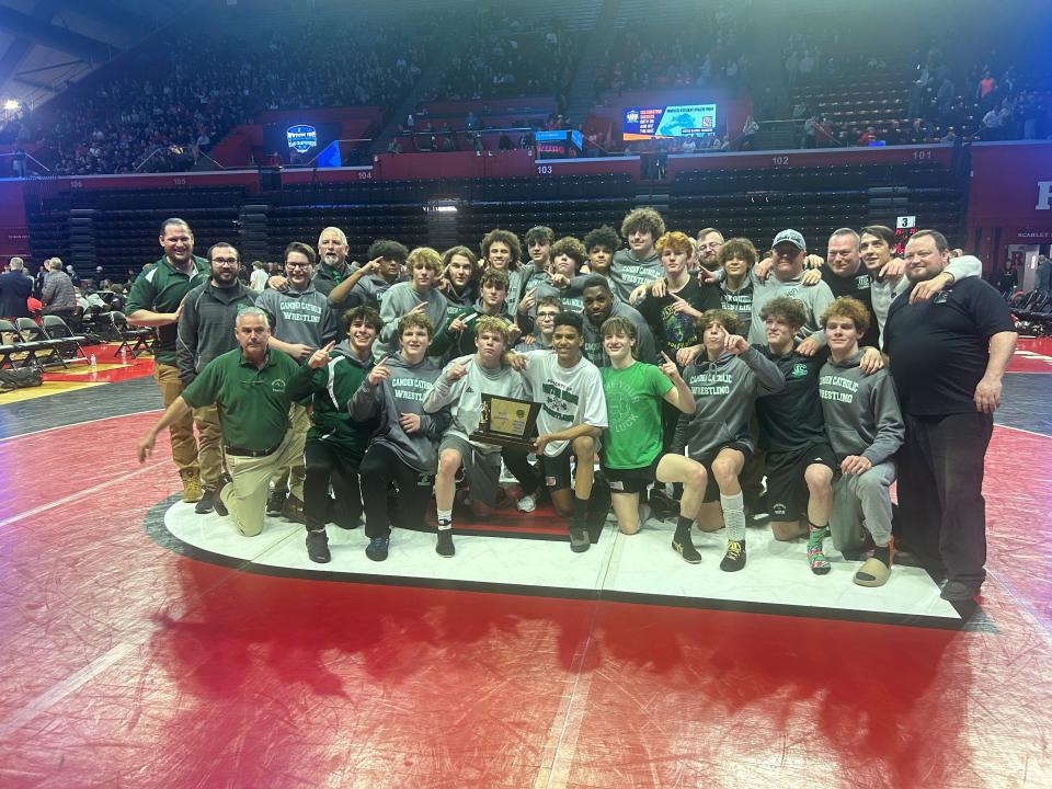 The Camden Catholic High School wrestling team captured the Non-Public B state title with a 33-29 win over St. John Vianney on Sunday at Rutgers University.