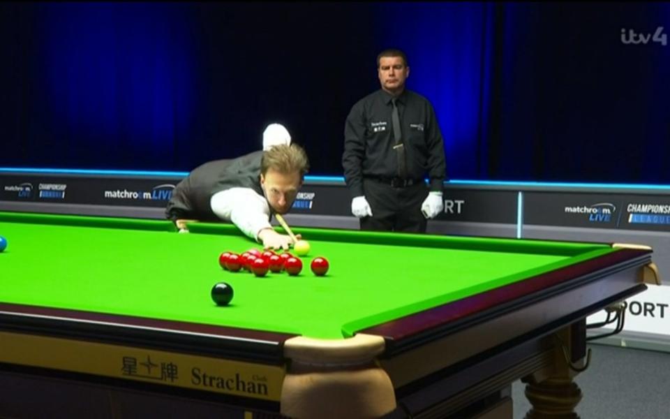 Judd Trump pots a red - PA