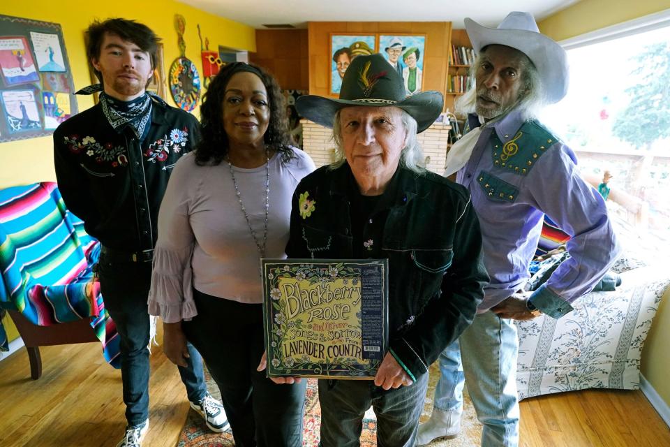 Patrick Haggerty, second from right, the founder and lead singer of Lavender Country, poses for a photo, at his home in Bremerton, Wash., with some of the musicians in his band, Jack Moriarity, left, LoLo Marie, second from left, and Bobby Inocente, right. Haggerty founded the band and recorded a country music album in 1973 that unabashedly explored LGBTQ themes, becoming a landmark that would nonetheless disappear for decades Music Lavender Country, Bremerton, United States - 18 Feb 2022