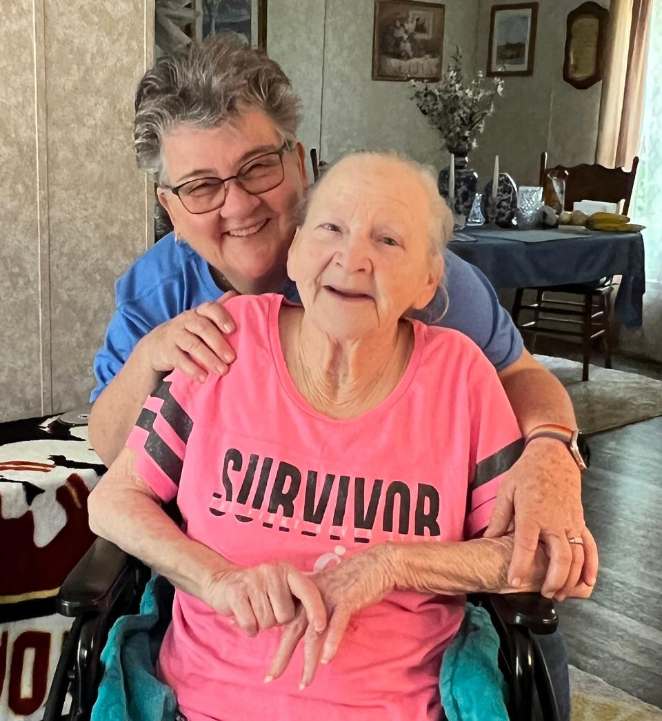 Malea Guiriba, founder and director of Pie in the Sky Community Alliance, which works to end senior hunger in St. Johns County, and one of her clients, Margaret Woods, 80.