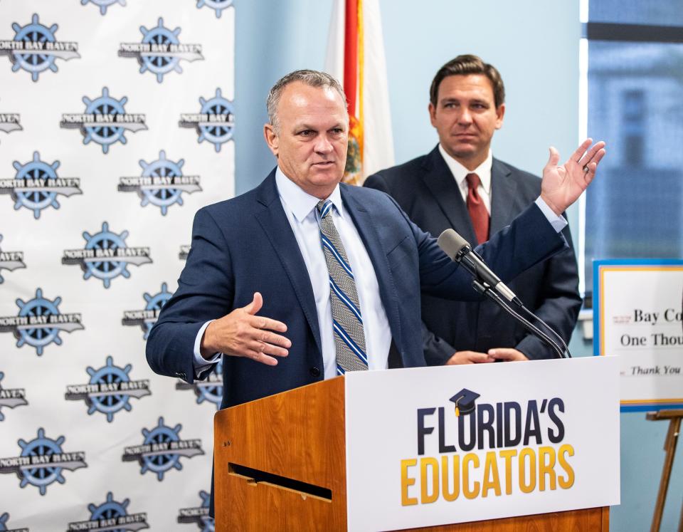 Then-Florida Commissioner of Education Richard Corcoran speaks in 2011 at a press conference with Gov. Ron DeSantis.