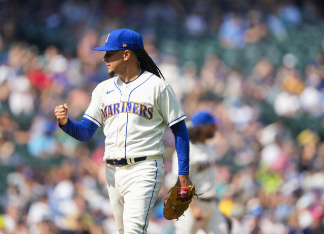 Seattle Mariners' Julio Rodriguez holds a trident in the dugout after  hitting a home run against the Oakland Athletics in a baseball game Monday,  Aug. 28, 2023, in Seattle. (AP Photo/Lindsey Wasson