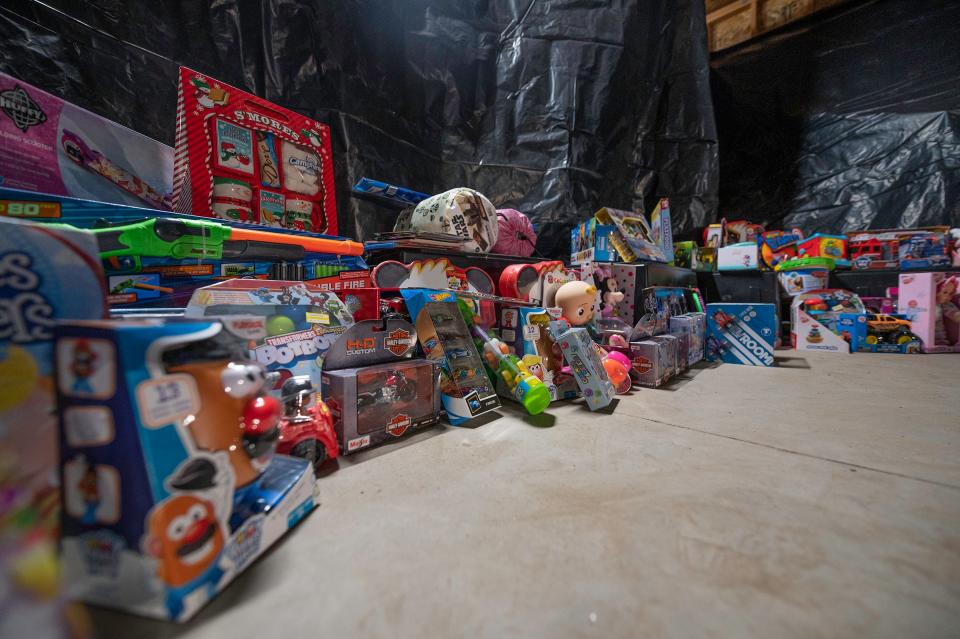 Loads of toys are stacked up after being donated at a recent toy drive in Pueblo.