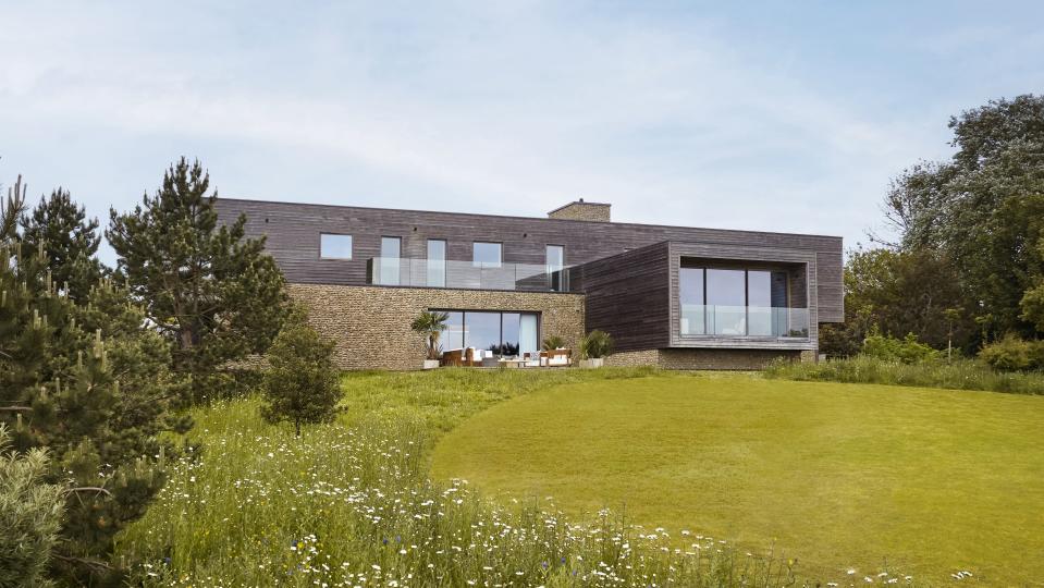 The £4.5 million Omaze house has five bedrooms in the main building, four others in a linked cabin, a separate home office, a home cinema, a gym and an outdoor pool. (Supplied)