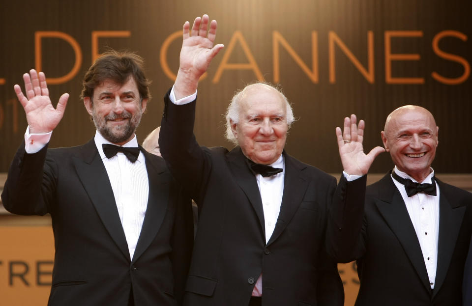 File - In this May 13, 2011 file photo, from left, director Nanni Moretti and actors Michel Piccoli and Dario Cantarelli arrive for the screening of Habemus Papam at the 64th international film festival, in Cannes, southern France.Michel Piccoli, a prolific screen star whose served as muse to filmmaker Luis Bunuel and was a leading man for Jean-Luc Godard, has died. He was 94. (AP Photo/Lionel Cironneau, File)