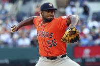 Houston Astros pitcher Ronel Blanco delivers in the second inning against the Texas Rangers in the first inning of a baseball game Sunday, April 7, 2024, in Arlington, Texas. (AP Photo/ Richard W. Rodriguez)