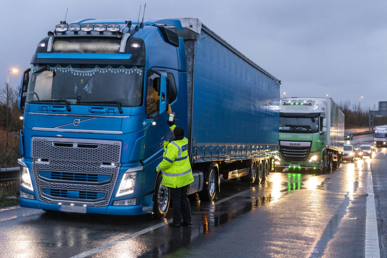 Lorries queuing to enter the Port of Dover in Kent and having their documentation inspected (SWNS)