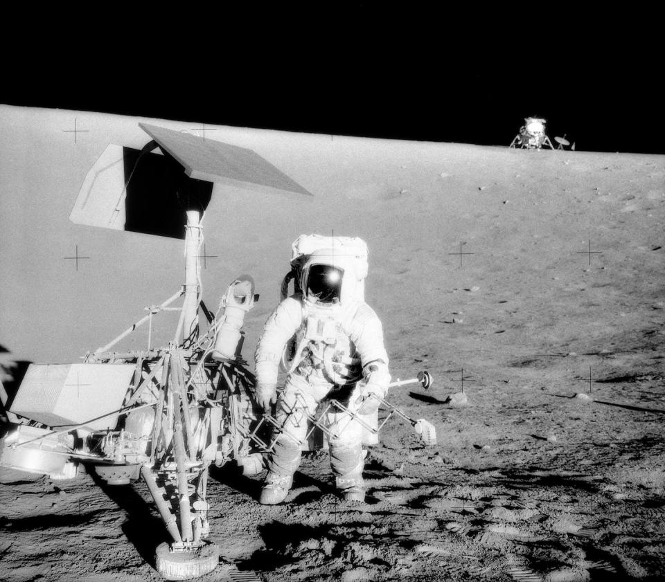 Dust from the landing of Apollo 12, seen in the background in this image, punctured metal on the Surveyor 3, front, from more than 500 feet away. <a href="http://grin.hq.nasa.gov/ABSTRACTS/GPN-2000-001316.html" rel="nofollow noopener" target="_blank" data-ylk="slk:NASA/Alan L. Bean;elm:context_link;itc:0;sec:content-canvas" class="link ">NASA/Alan L. Bean</a>