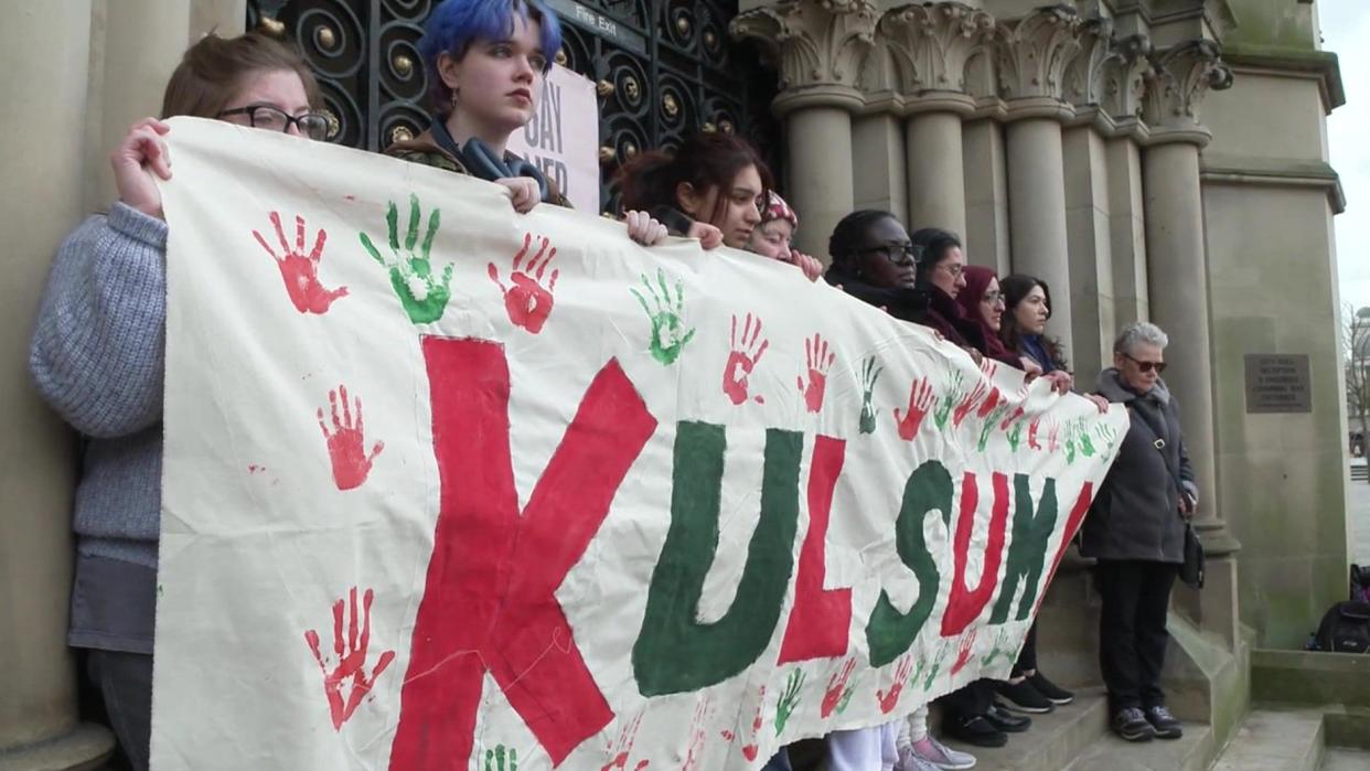 A banner at the vigil for Kulsuma Akter