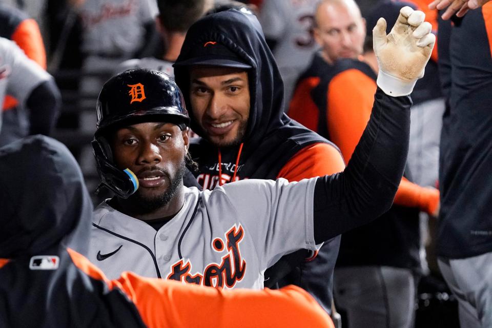 Detroit Tigers' Akil Baddoo celebrates with teammates after scoring on a sacrifice fly by Riley Greene during the seventh inning of a baseball game against the Chicago White Sox at Guaranteed Rate Field in Chicago on Sept. 23, 2022.