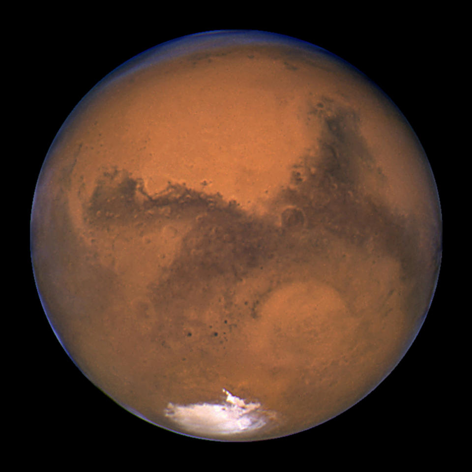 <p>NASA’s Hubble Space Telescope took this snapshot of Mars 11 hours before the planet made its closest approach to Earth on Aug. 26, 2003. (Photo: J. Bell (Cornell U.) and M. Wolff (SSI)/NASA/Reuters) </p>