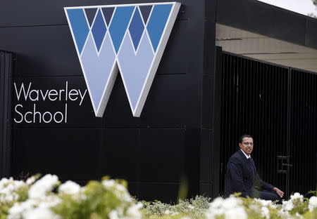 Kamal Hanif, school principal of Waverley School, poses for a portrait at the school in Birmingham, Britain, June 26, 2015. Picture taken June 26, 2015. REUTERS/Andrew Yates