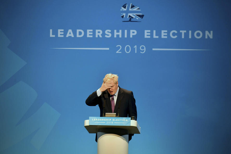Conservative party leadership candidate Boris Johnson gestures, during the first party hustings at the ICC in Birmingham, England, Saturday June 22, 2019. (Ben Birchall/PA via AP)
