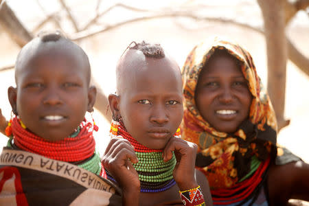 Turkana girls are seen at a waterhole near Lokichar, in Turkana County, Kenya February 7, 2018. REUTERS/Baz Ratner