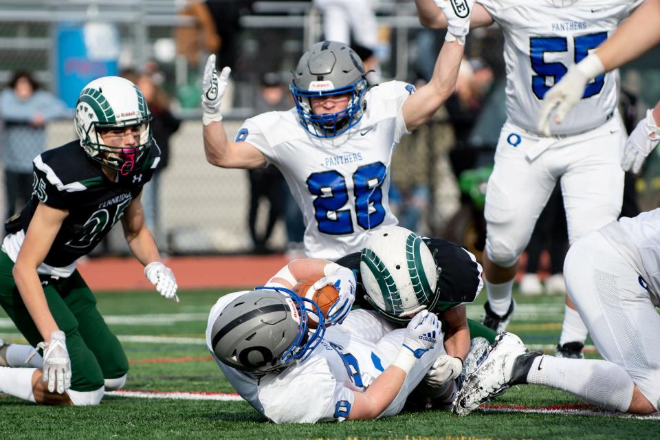 Quakertown running back Tyler Woodman lands in the end zone a 1-yard touchdown run against Pennridge during the annual Thanksgiving game at Helman Field in Perkasie on Thursday, November 25, 2021. The Panthers shutout the Rams 21-0.