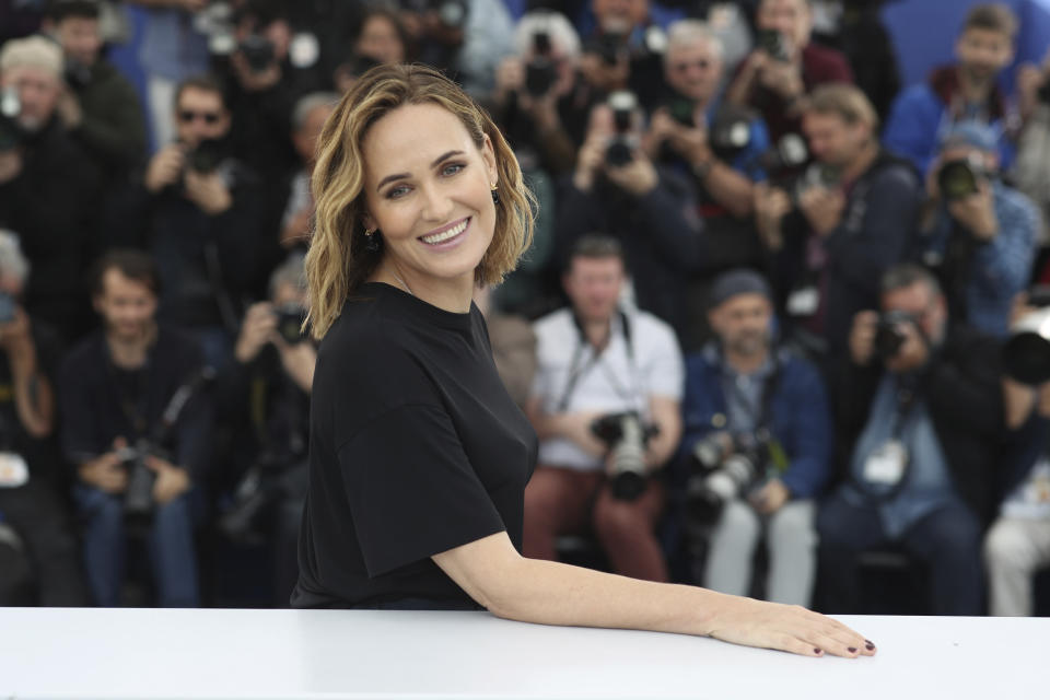 FILE - Actress Judith Godreche poses for photographers at the photo call for the film 'The Climb' at the 72nd international film festival, Cannes, southern France, Friday, May 17, 2019. As French cinema basks in Oscar attention, actresses who allege they were teenage victims of sexual abuse by directors decades older than them are shining the light on the repulsive underside of French cinema. Another step in the #MeToo movement that's been gathering pace in the industry could come at the French cinema awards on Friday Feb. 23 2024. French newspapers Le Parisien and Liberation report that Godrèche is to make a speech on sexual violence in the cinema industry at the Cesar Awards' ceremony, the French version of the Oscars. (AP Photo/Petros Giannakouris, File)