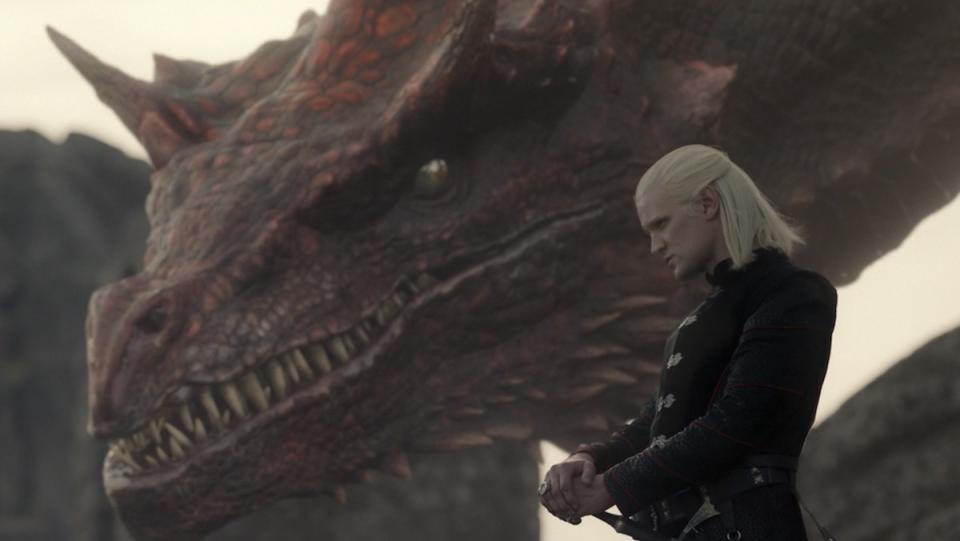 Daemon Targaryen stands next to the head of hid dragon Caraxes on House of the Dragon
