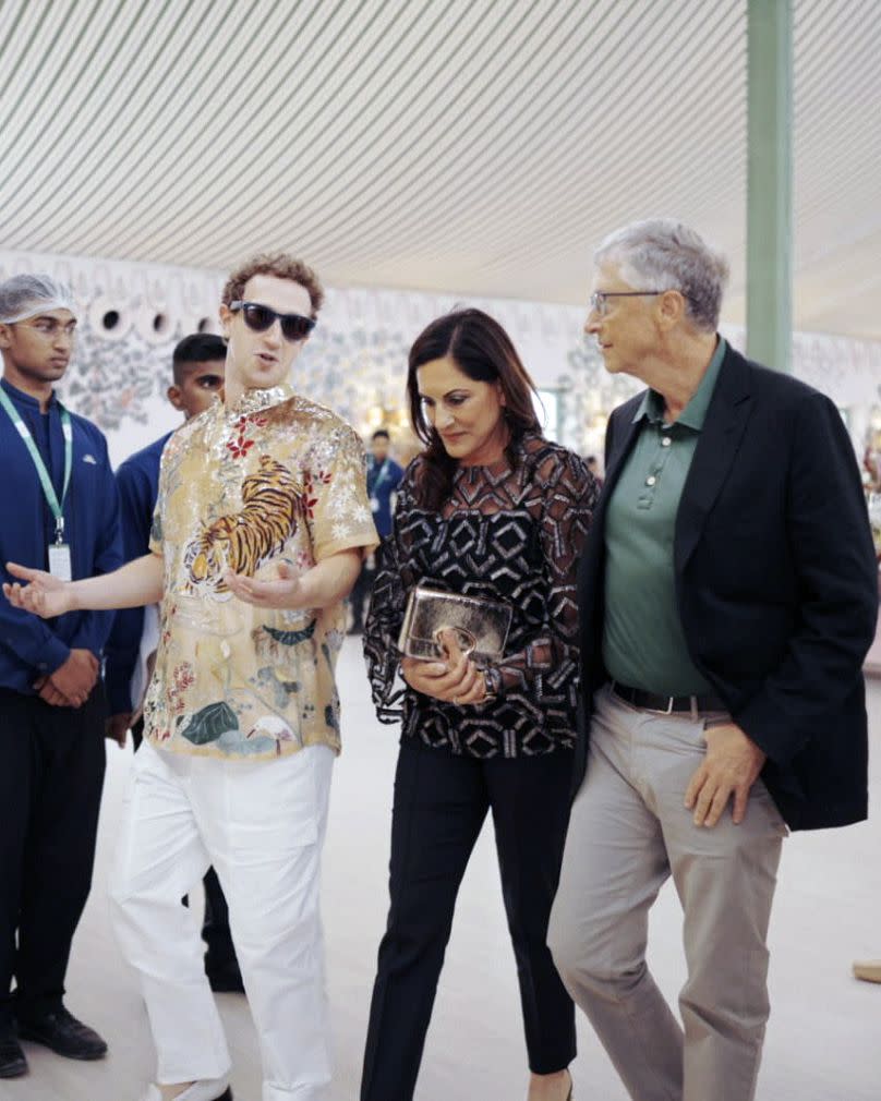 Mark Zuckerberg speaking to Bill Gates and Paula Hurd at the pre-wedding celebrations.