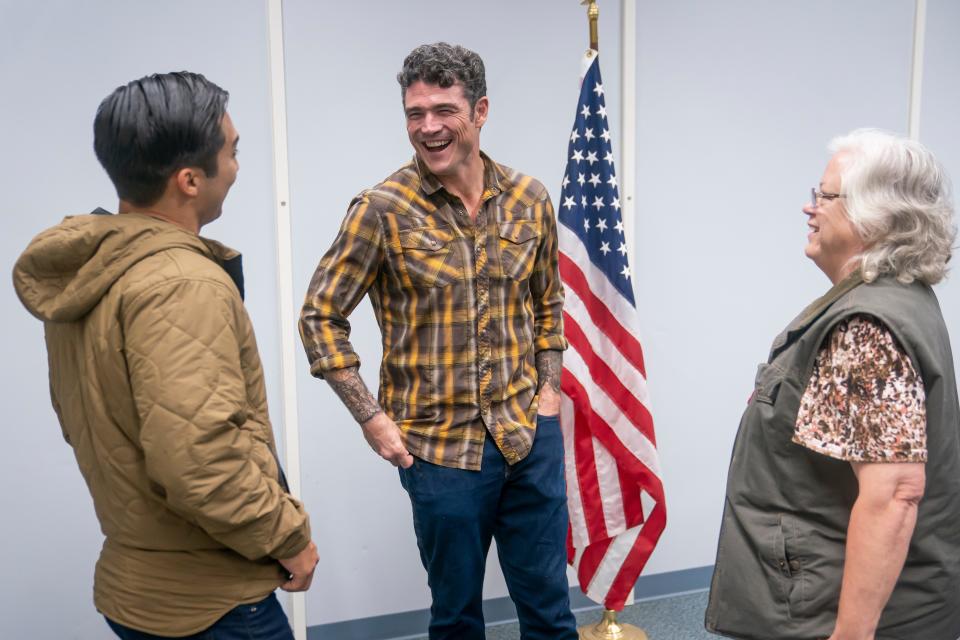 Republican Congressional candidate Joe Kent talks with attendees at a campaign event on October 5, 2022 in Morton, Washington.