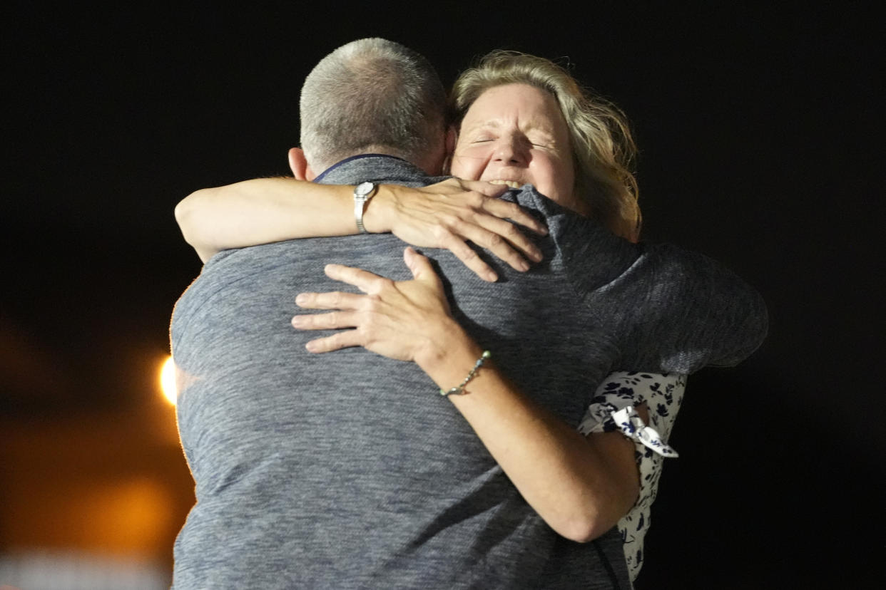 Paul Whelan hugs his sister, Elizabeth Whelan.