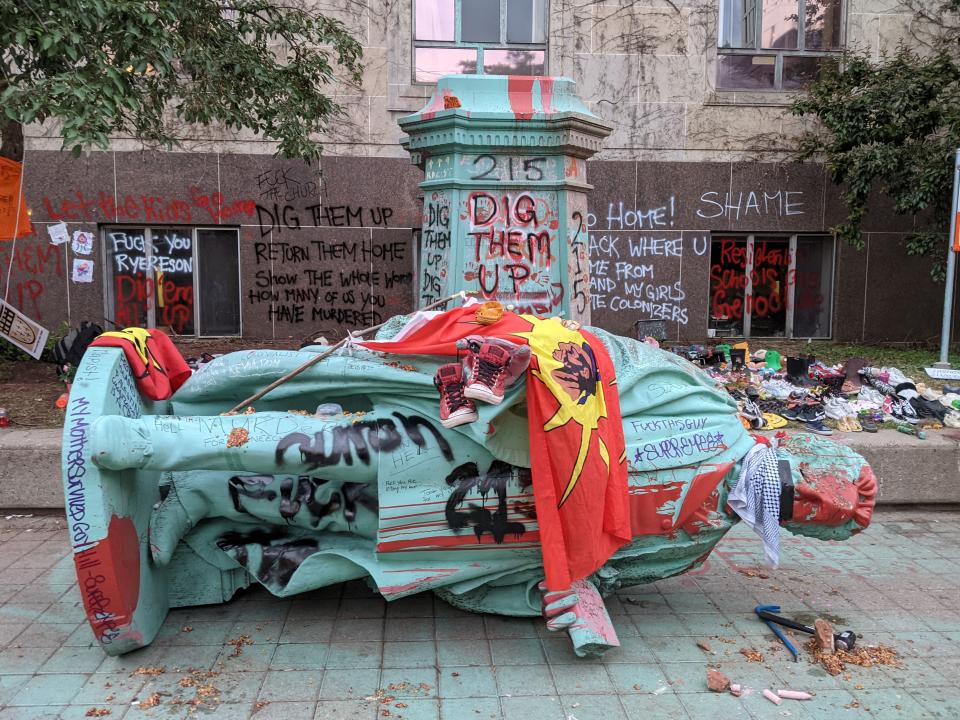 Photos: Statue of Egerton Ryerson at Toronto university toppled, won't be replaced