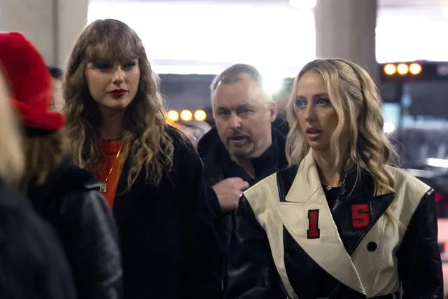 <p>Kara Durrette/Getty</p> Brittany Mahomes arrives to the Chiefs-Ravens game with Taylor Swift on Jan. 28.