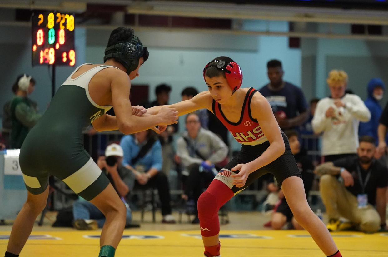 Sleepy Hollow's Dorian Hidalgo wrestles Pleasantville's Fredy Mejia in the 108-pound championship match at the Section 1, Division II wrestling championships at Westchester County Center on Saturday, Feb. 10, 2024.