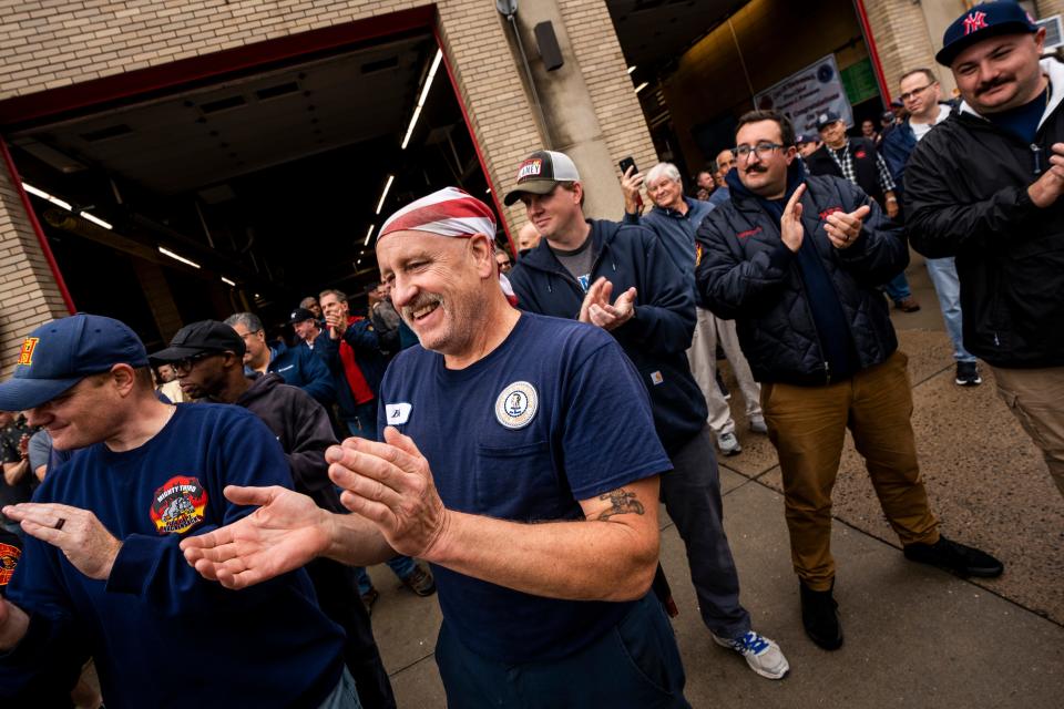 People gather at the Hackensack Fire Department headquarters on Friday, September 29, 2023 to see off Hackensack Fire Chief Thomas Freeman who is retiring after 40 years,