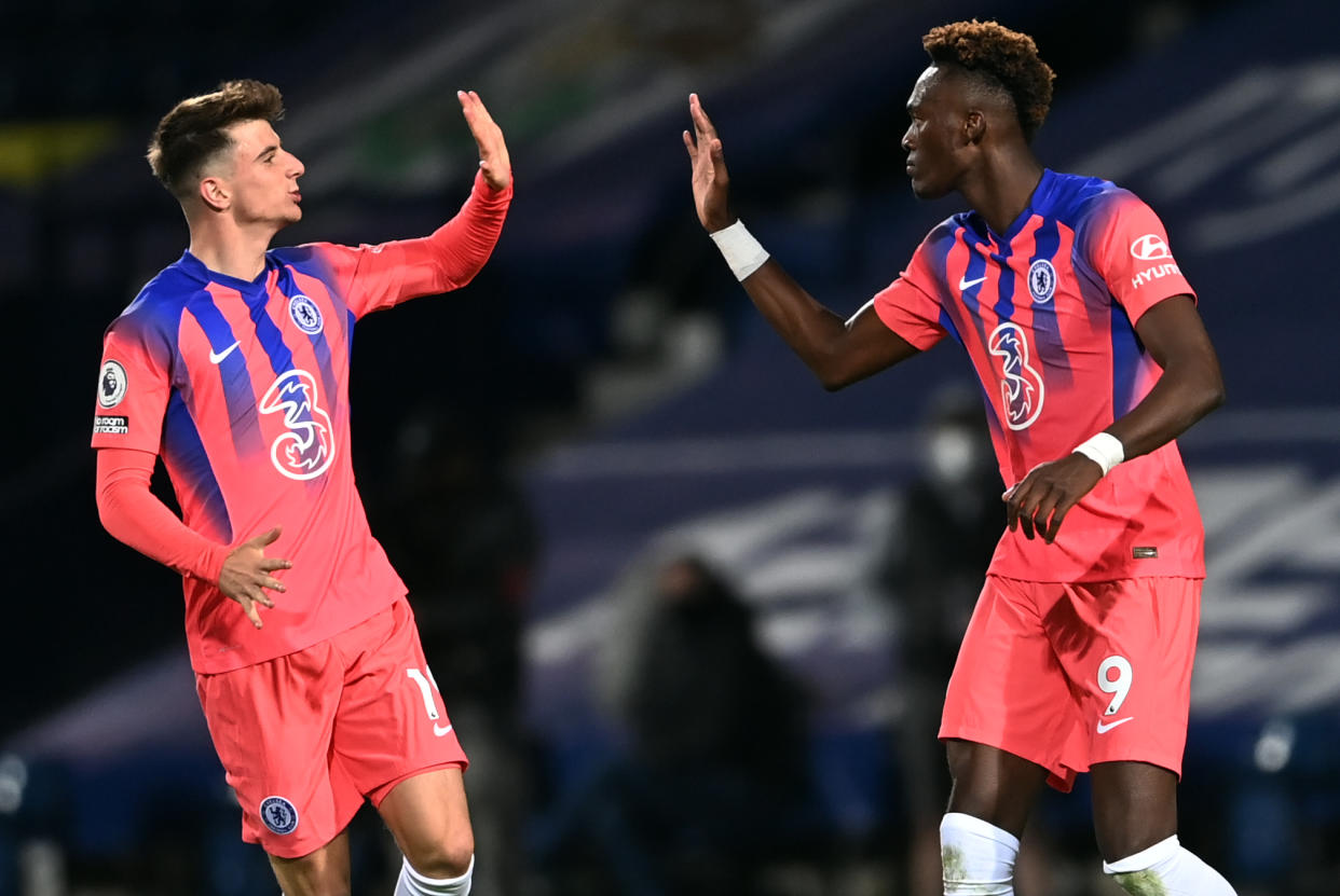 Tammy Abraham (right) celebrates with Chelsea teammate Mason Mount after scoring a stoppage-time equalizer against West Bromwich Albion. (Laurence Griffiths/Getty Images)