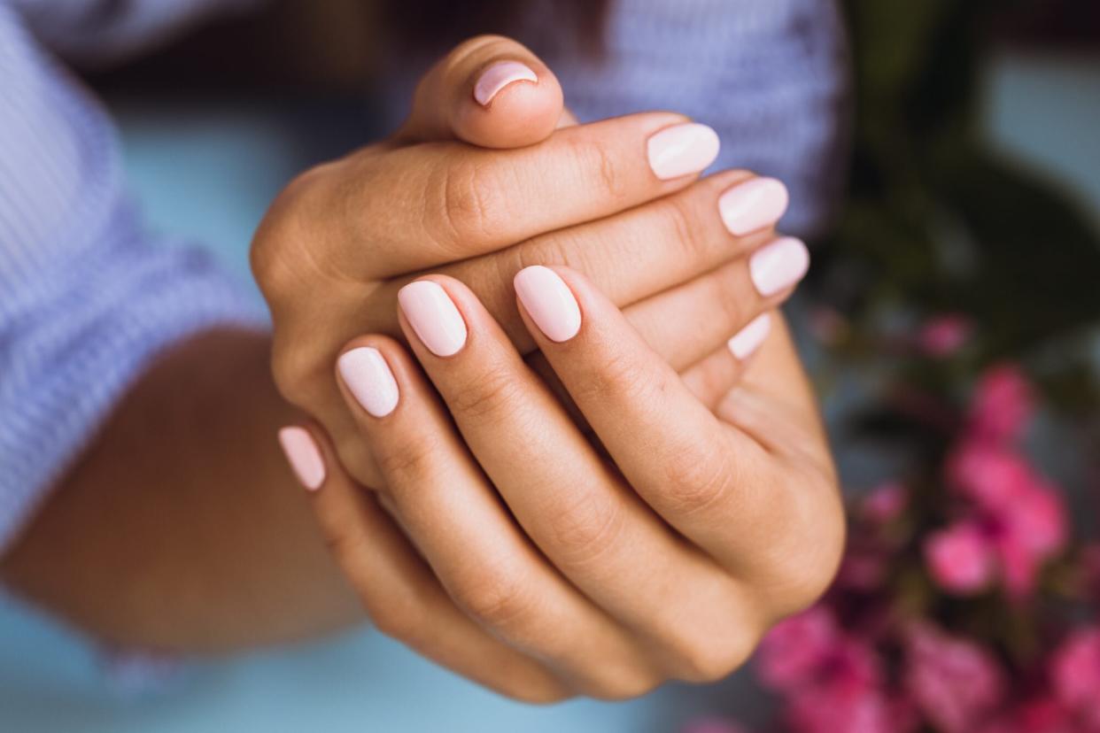 close up of womans fingernails