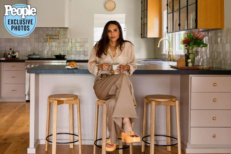 <p>Jessica Isaac</p> Lesley-Ann Brandt poses inside her newly-renovated kitchen. 