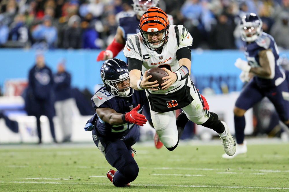 Burrow overcomes nine sacks to guide Bengals to AFC Championship game