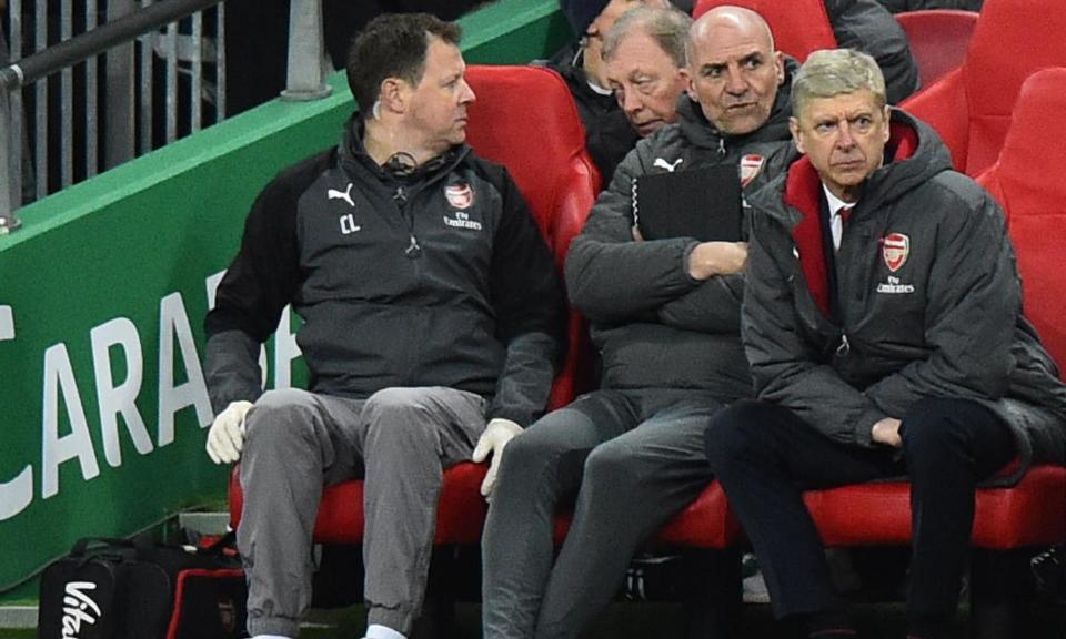 Under pressure: Arsène Wenger watches on during the demoralising Carabao Cup final defeat to Manchester City.