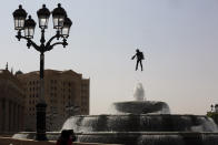 British inventor Richard Browning uses a jet pack to display his technology at the Ritz Carlton Hotel where the Future Investment Initiative forum is being held in Riyadh, Saudi Arabia, Tuesday, Oct. 29, 2019. The long-planned initial public offering of a sliver of Saudi Arabia's state-run oil giant Saudi Aramco will see shares traded on Riyadh's stock exchange in December, a Saudi-owned satellite news channel reported Tuesday as the kingdom's marquee investment forum got underway. (AP Photo/Amr Nabil)