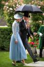 <p>Prince William shares his umbrella with Kate Middleton during day one of Royal Ascot at Ascot Racecourse.</p>