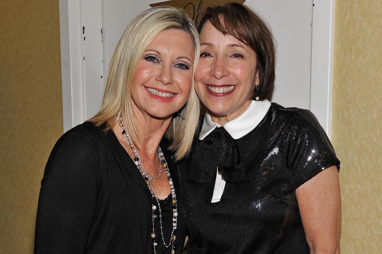 Entertainer Olivia Newton-John (L) and actress Didi Conn appear after they performed "Summer Nights" together at Flamingo Las Vegas on January 3, 2015 in Las Vegas, Nevada.