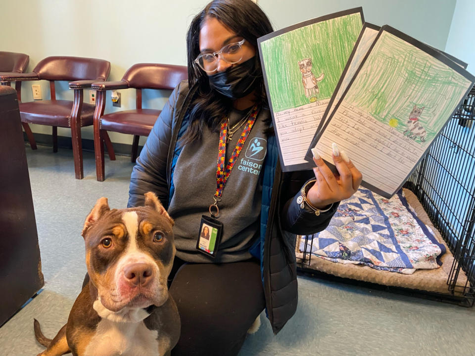 Everyone who adopted a dog that came with an essay and drawing from St. Michael's Episcopal School students got to take it home with them and their new furry friend. (Courtesy St. Michael's Episcopal School)