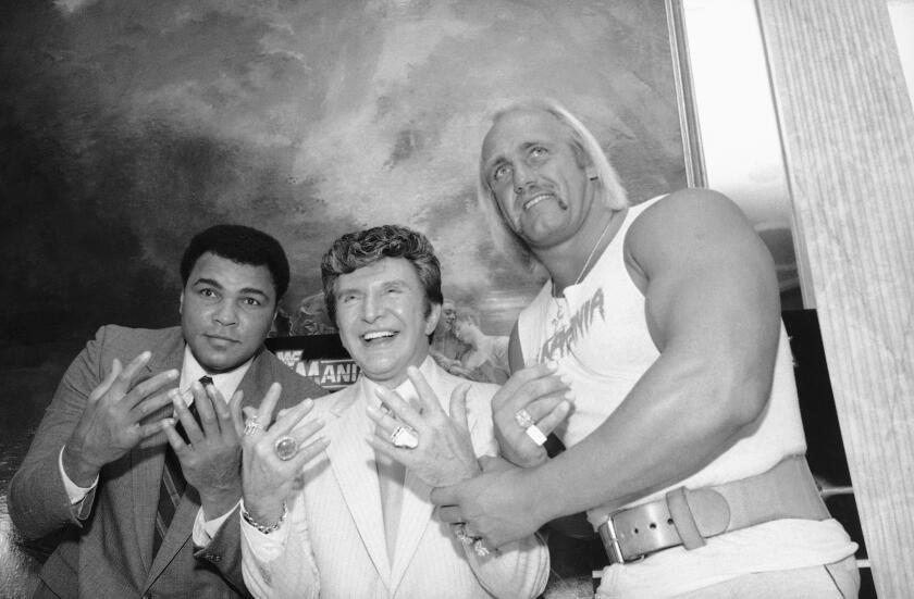 Muhammad Ali, Liberace and Hulk Hogan pose together at Madison Square Garden