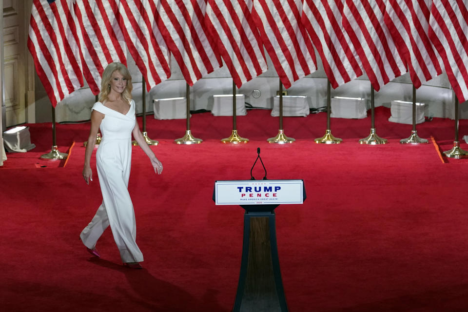 White House counselor Kellyanne Conway walks onto the stage to tape her speech for the third day of the Republican National Convention from the Andrew W. Mellon Auditorium in Washington, Wednesday, Aug. 26, 2020. (AP Photo/Susan Walsh)