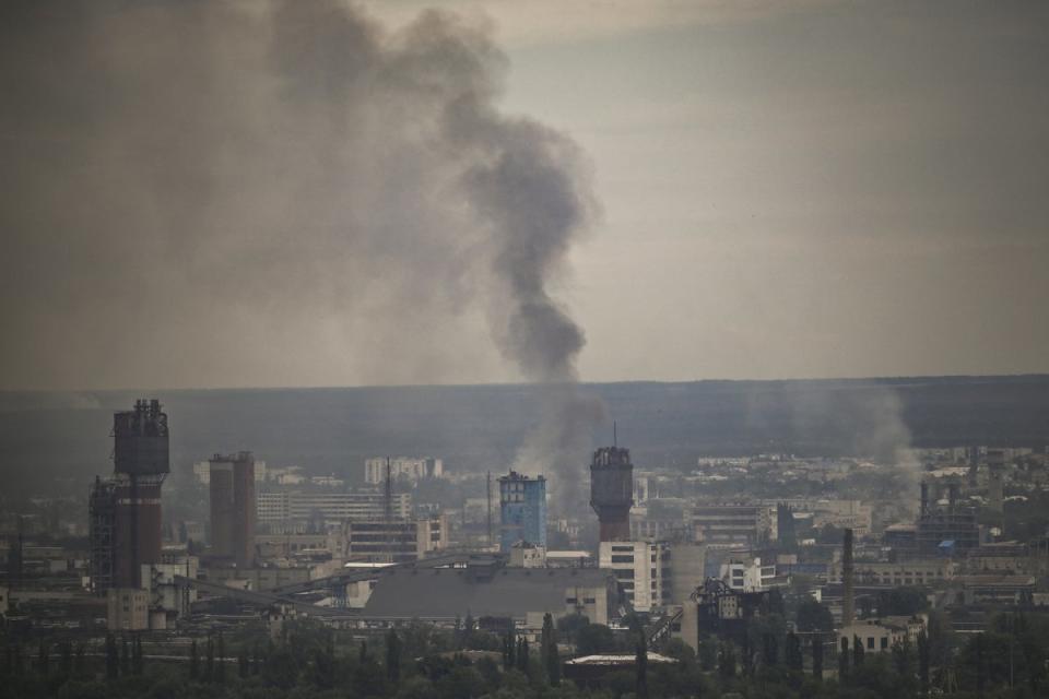 Smoke rises from the city of Severodonetsk in the eastern Ukrainian region of Donbas amid Russian invasion of Ukraine (AFP via Getty Images)