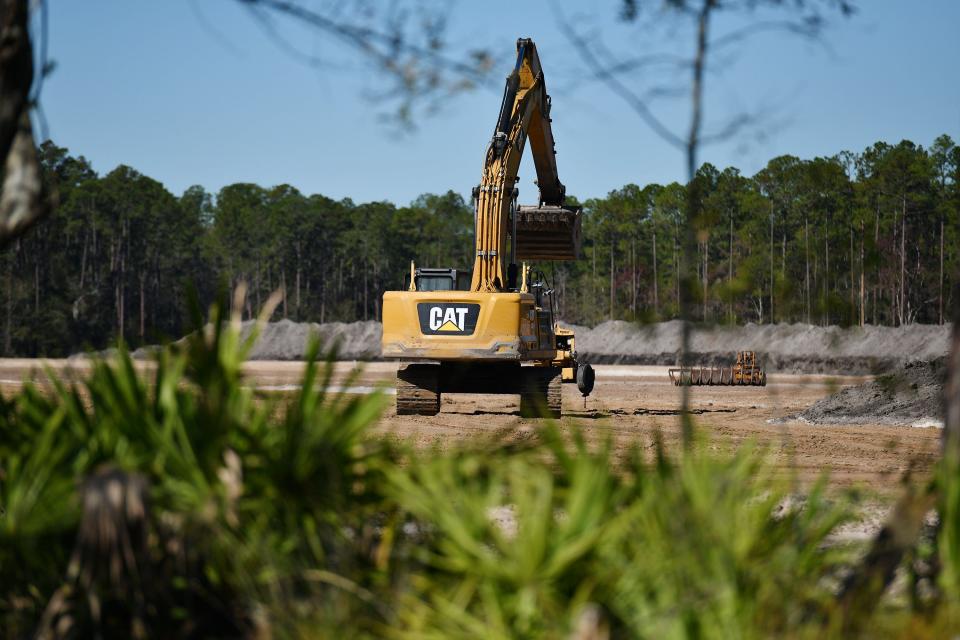 Heavy equipment stands on the large swath of land alongside Normandy Boulevard where site work has begun on the grounds of Taye Brown Regional Park for construction of a new Jacksonville Fairgrounds that could host its first Greater Jacksonville Agricultural Fair in 2025.