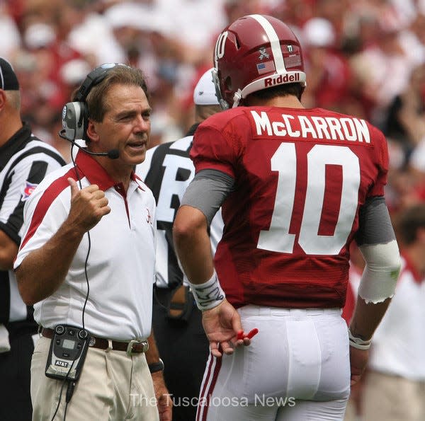 9-3-2010 -- Tuscaloosa, Ala -- Alabama Coach Nick Saban talks with quarterback A.J. McCarron (10) during the first quarter against Kent State at Bryant-Denny Stadium in Tuscaloosa, Ala on Saturday Sept 3, 2011. Alabama beat Kent State by a score of 48-7. (Tuscaloosa News / Robert Sutton)