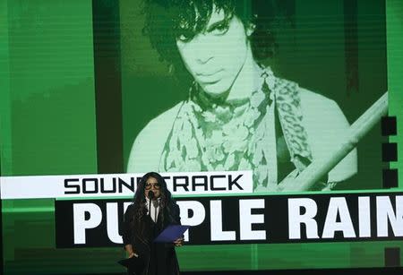 Tyka Nelson, sister of the late musician Prince, accepts the award for top soundtrack for "Purple Rain" at the 2016 American Music Awards in Los Angeles, California, U.S., November 20, 2016. REUTERS/Mario Anzuoni/File Photo