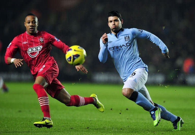 Manchester City striker Sergio Aguero (R) competes with Southampton defender Nathaniel Clyne, on February 9, 2013. City's hopes of retaining their Premier League title were in tatters after a shock 3-1 defeat left manager Roberto Mancini to virtually concede the championship