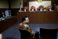 Former Indoensian parliament speaker Setya Novanto sits before his trial at a court room in Jakarta, Indonesia, April 24, 2018. REUTERS/Beawiharta