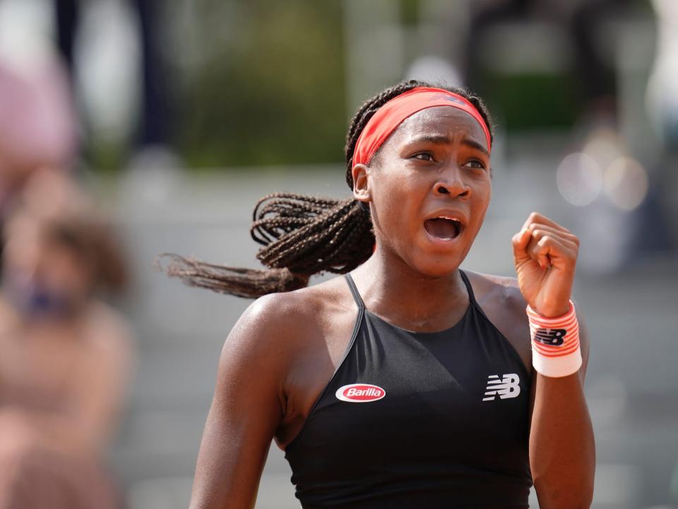 Coco Gauff celebrates at the French Open.