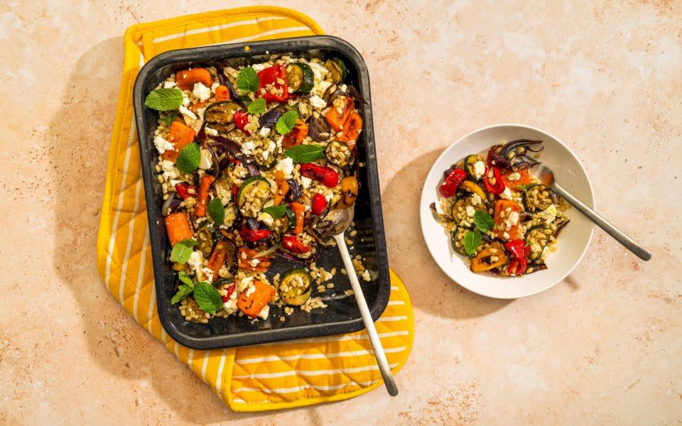 Roasted Mediterranean vegetables with feta and warm grains